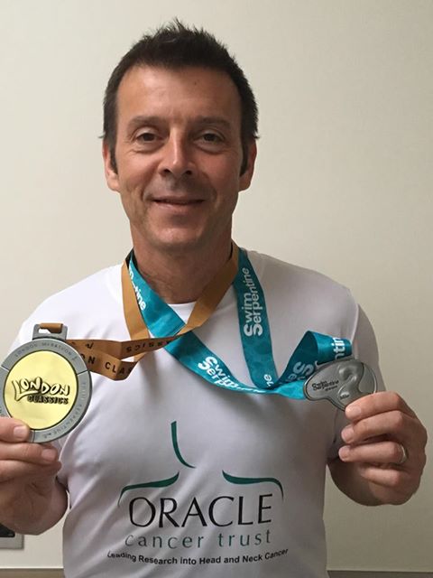Giles Cuthbert with medal