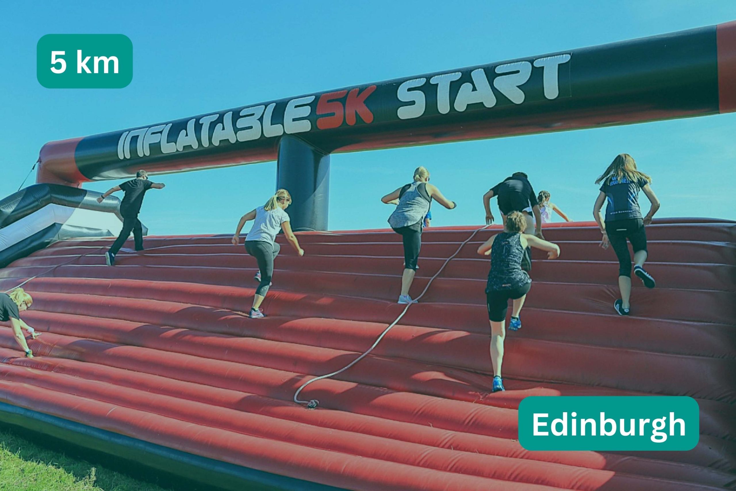 People running over inflatable obstical start line. Title text: 5km, Edinburgh
