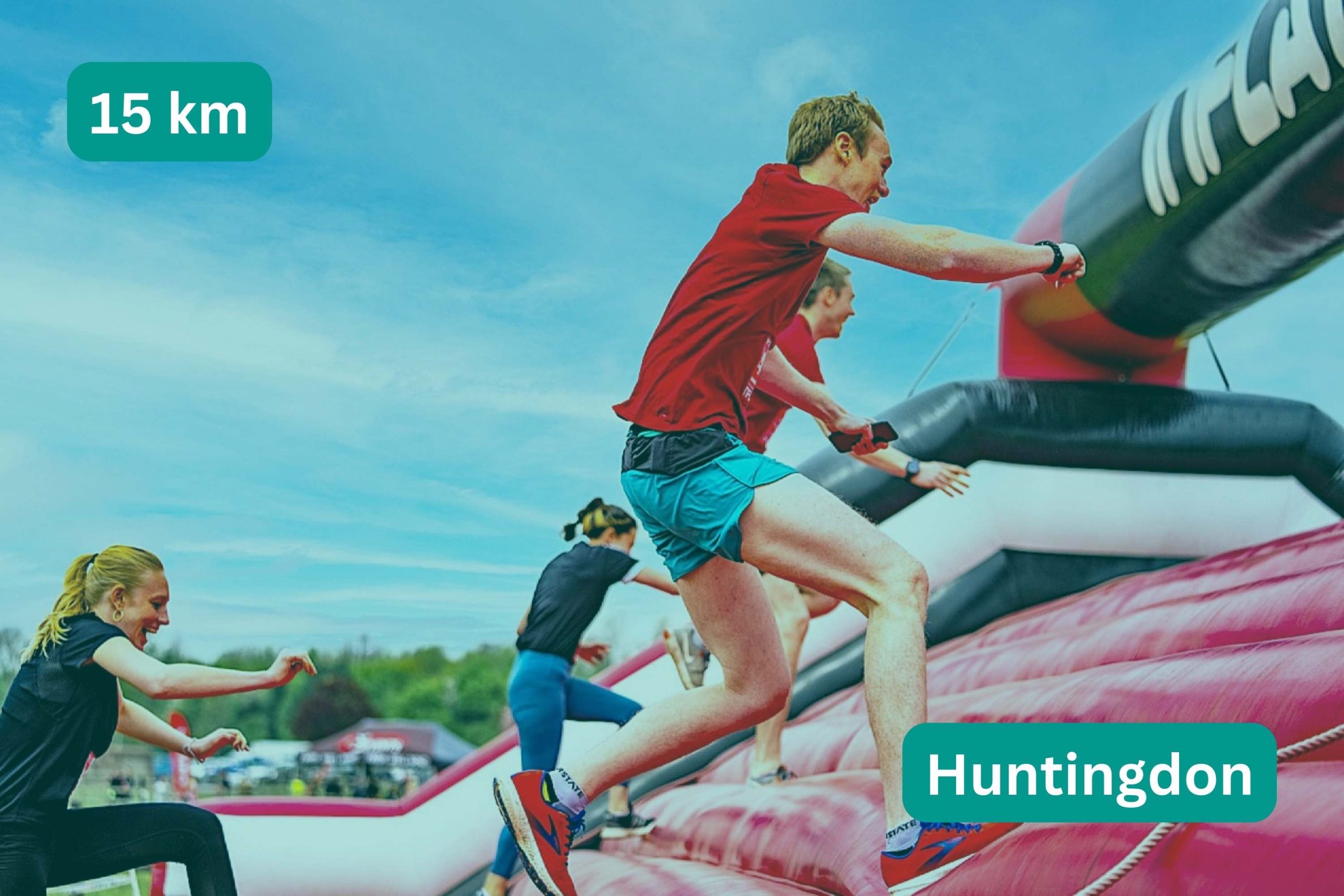 People climbing over inflatable obstacale. Headline text: 15km, Huntingdon
