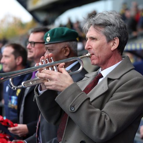 Andrew playing the last post at Oxford United